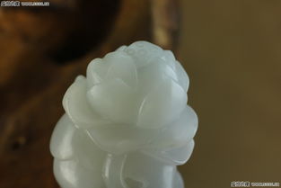 細(xì)膩油潤(rùn) 660元青海和田玉白玉蓮花把件品鑒